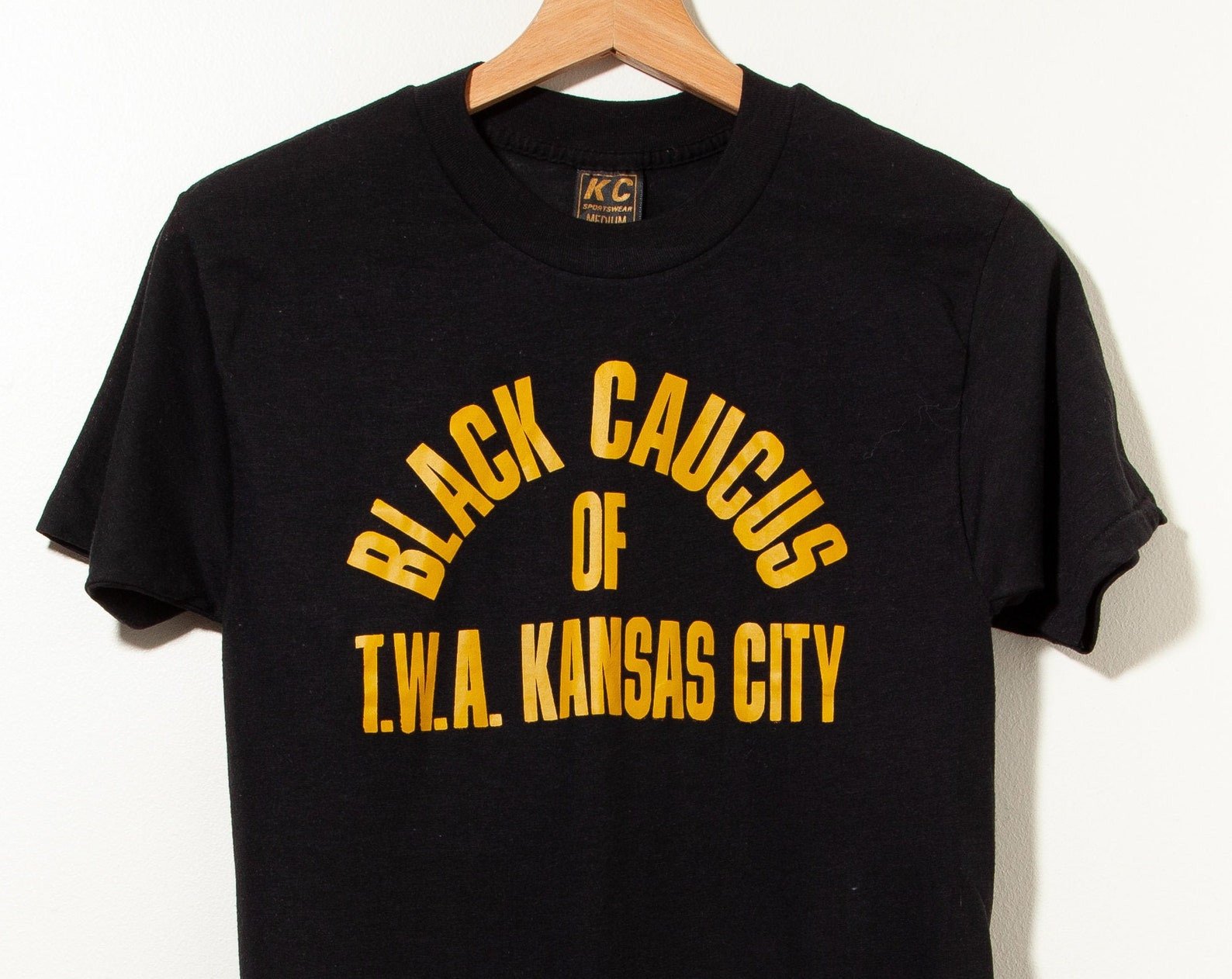 1980S Vintage Black Caucus Of Twa Kansas City Spell Out Graphic T Shirt Graphic Usa
