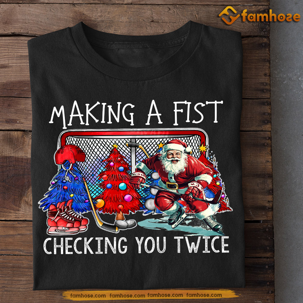Christmas Hockey T-shirt, Making A Fist Checking You Twice, Xmas Gift For Hockey Lovers, Hockey Players Theteetrend Where Art Meets Style